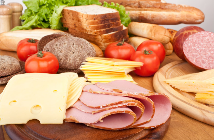 Acid-forming foods like deli meats, cheese, and bread, which can impact inflammation and bone health when not balanced.