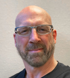 DR. DOUG KLOBUTCHER