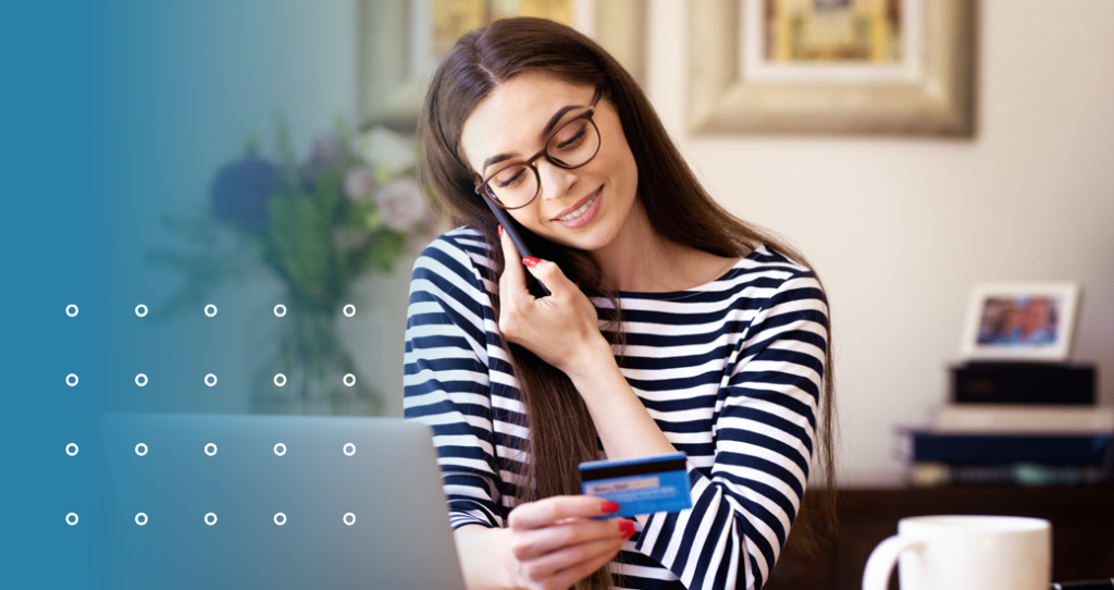 Woman on the phone holding FSA card