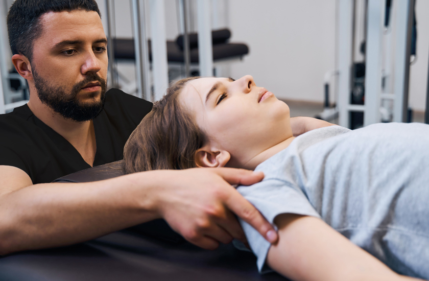 Chiro One Chiropractor performing a gentle shoulder and neck adjustment on a young athlete to help with sports injury recovery and physical wellness.